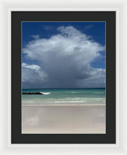 Storm Clouds Over Tranquil Beach - Framed Print